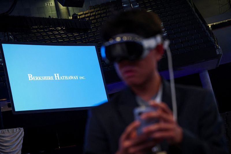 A shareholder wears a VR Headset during the Berkshire Hathaway Inc. annual shareholders' meeting, the conglomerate's first since Warren Buffett stepped down after 60 years as chief executive and was succeeded by Greg Abel, in Omaha, Nebraska, U.S., May 2, 2026. REUTERS/Brendan McDermid
