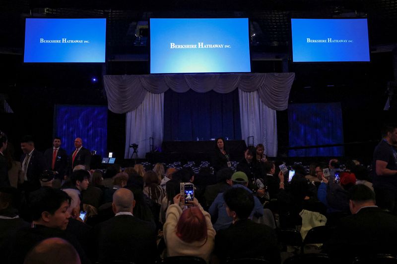 FILE PHOTO: Shareholders attend the Berkshire Hathaway Inc. annual shareholders' meeting, the conglomerate's first since Warren Buffett stepped down after 60 years as chief executive and was succeeded by Greg Abel, in Omaha, Nebraska, U.S., May 2, 2026. REUTERS/Brendan McDermid/File Photo