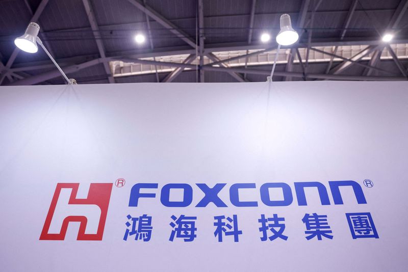 FILE PHOTO: Foxconn logo is on display at the company’s annual tech day in Taipei, Taiwan, November 21, 2025. REUTERS/Ann Wang/File Photo