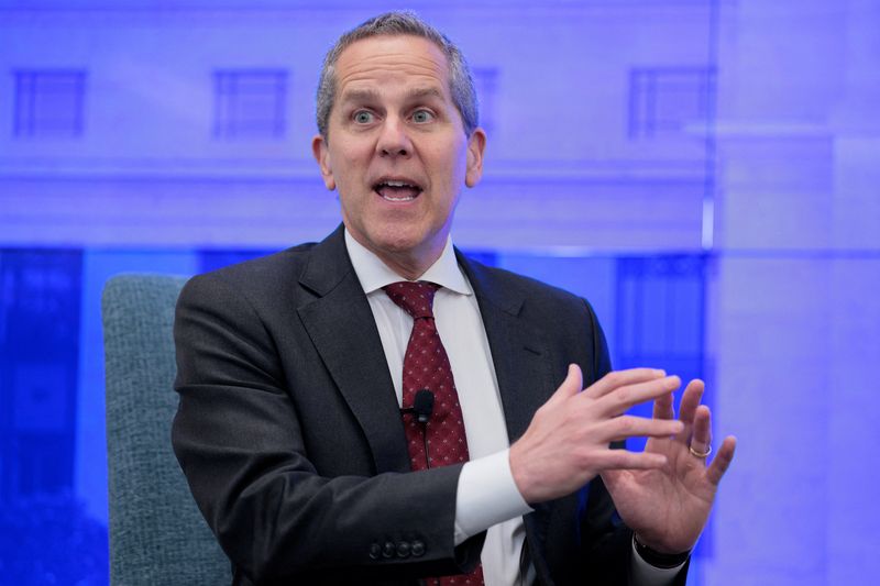 Federal Reserve Board Governor Michael Barr speaks during a panel before the "Strengthening America's Economy Through Rural Investment: a Working Forum" hosted by the Federal Reserve Board of Governors, in Washington, D.C., U.S., April 14, 2026. REUTERS/Evan Vucci