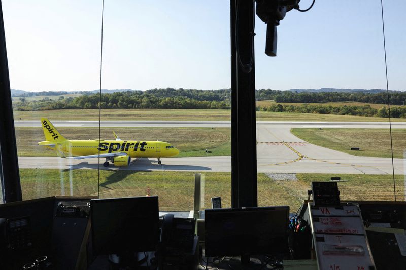 FILE PHOTO: A Spirit Airlines flight departs Arnold Palmer Regional Airport in Westmoreland County, Pennsylvania, U.S., September 18, 2025.  REUTERS/Quinn Glabicki/File Photo