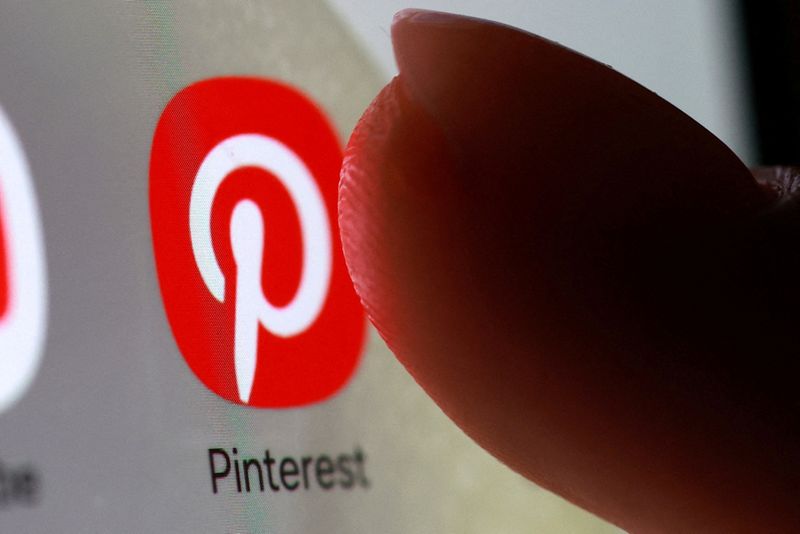 FILE PHOTO: The Pinterest app icon on a smartphone in this illustration taken October 27, 2025. REUTERS/Dado Ruvic/Illustration/File Photo