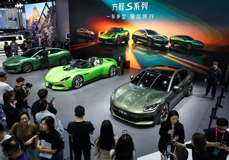 People gather near the newly presented electric cars, Formula S, Formula X, and Formula SL of BYD's brand Fang Cheng Bao appear at the company’s booth at the Beijing International Automotive Exhibition (Auto China), in Beijing, China, April 24, 2026. REUTERS/Maxim Shemetov