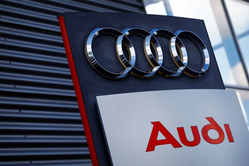 A logo of Audi is seen outside a car dealer in Nijmegen, Netherlands February 26, 2025. REUTERS/Piroschka van de Wouw