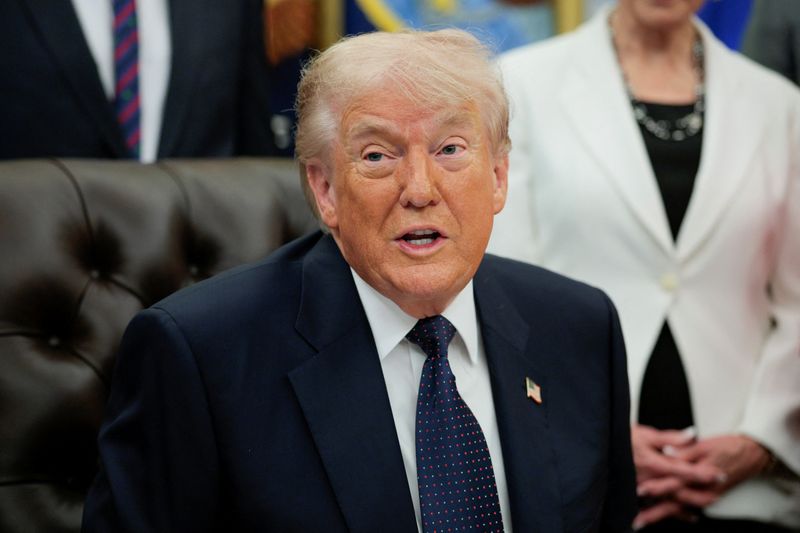 U.S. President Donald Trump speaks during an event to sign a memorandum in the Oval Office at the White House in Washington, D.C., U.S., May 5, 2026. REUTERS/Evan Vucci