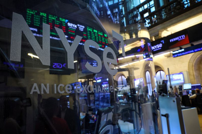 Traders work on the floor at the New York Stock Exchange (NYSE) in New York City, U.S., May 5, 2026.  REUTERS/Brendan McDermid