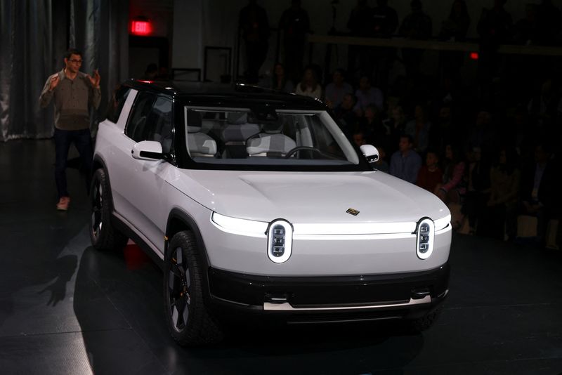 Rivian CEO RJ Scaringe speaks at an event to unveil a smaller R2 SUV in Laguna Beach, California, U.S., March 7, 2024. REUTERS/Mike Blake