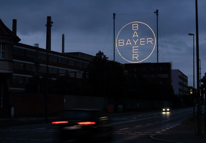 The 120 metres high Bayer Cross, logo of German pharmaceutical and chemical maker Bayer AG, consisting of 1710 LED glass bulbs is seen outside the industrial park "Chempark" of the chemical industry in Leverkusen, Germany, September 23, 2023. REUTERS/Wolfgang Rattay