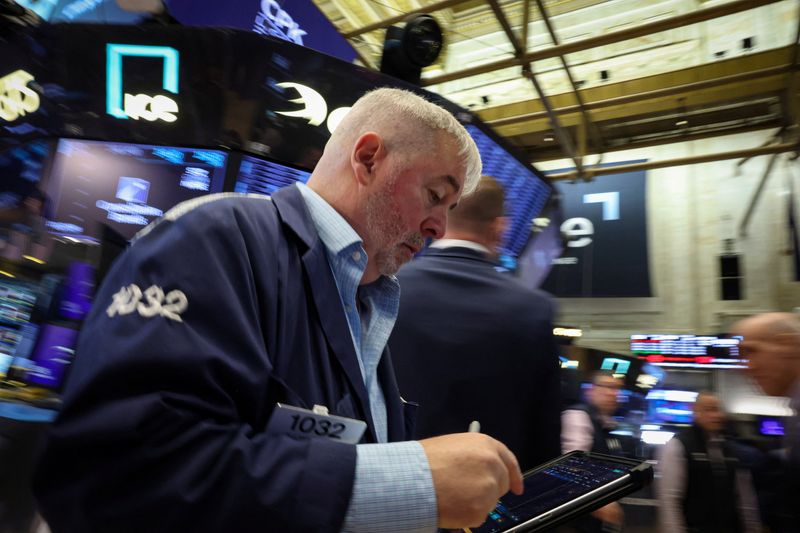 Traders work on the floor at the New York Stock Exchange (NYSE) in New York City, U.S., May 5, 2026.  REUTERS/Brendan McDermid