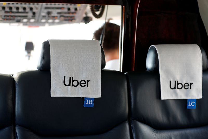 Seats with Uber logos are seen inside a helicopter operated by Uber Copter, a new service by the ride-sharing company Uber, providing service from Manhattan to New York's JFK International Airport initially for Diamond and Platinum Uber Rewards members as well as special Uber partners in New York, U.S., October 2, 2019.  Picture taken October 2, 2019. REUTERS/Mike Segar