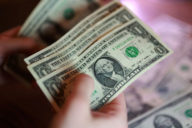 U.S. dollar banknotes are seen in this illustration taken March 24, 2026. REUTERS/Dado Ruvic/Illustration