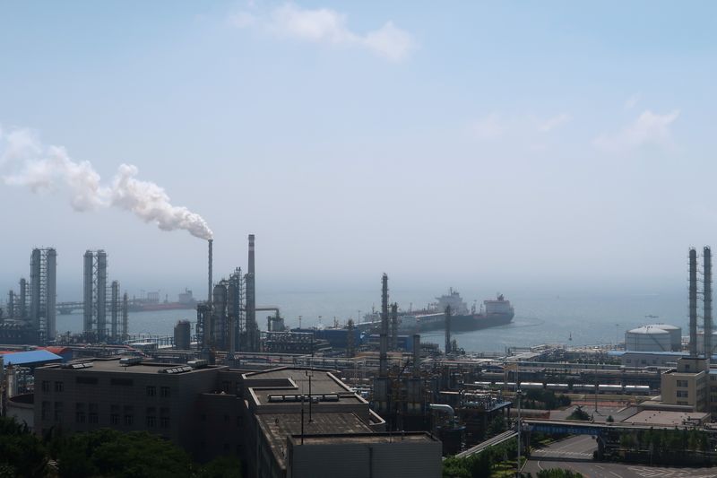 China National Petroleum Corporation (CNPC)'s Dalian Petrochemical Corp refinery is seen near the downtown of Dalian in Liaoning province, China July 17, 2018. Picture taken July 17, 2018. REUTERS/Chen Aizhu