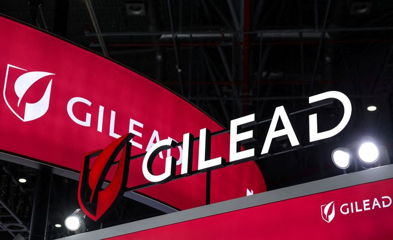 FILE PHOTO: Logos of Gilead at the company’s booth at the 8th China International Import Expo (CIIE) in Shanghai, China, November 6, 2025.REUTERS/Maxim Shemetov/File Photo