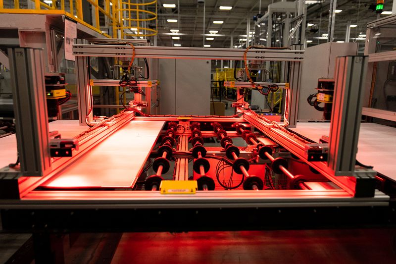 An assembly line moves solar panels through manufacturing at First Solar in Perrysburg, Ohio July 8, 2022. REUTERS/Megan Jelinger