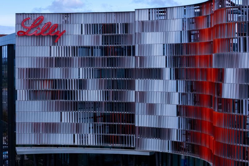A drone view shows the Eli Lilly logo on one of the company’s offices after it hit $1 trillion in market value on Friday, becoming the first drugmaker to join the exclusive club dominated by tech giants and underscoring its rise as a weight-loss powerhouse, in San Diego, California, U.S., November 21, 2025. REUTERS/Mike Blake/File Photo