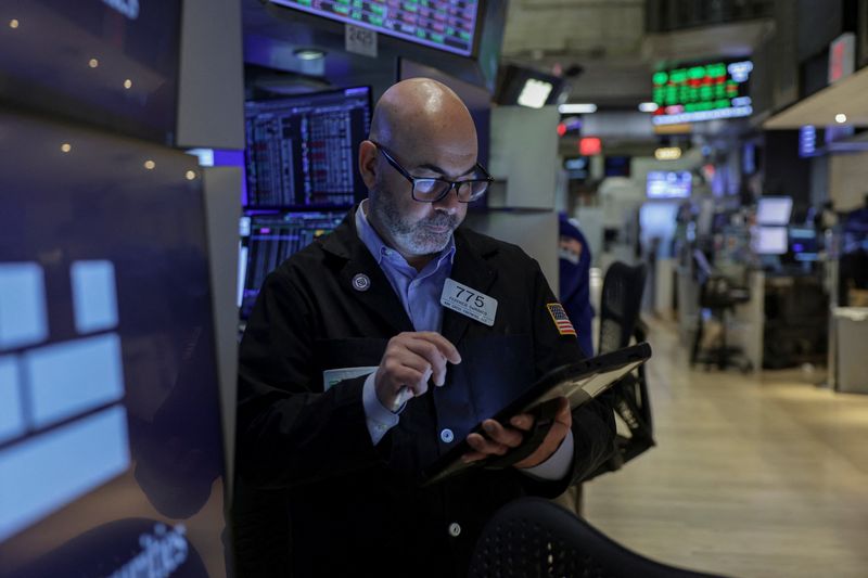 A trader works on the floor at the New York Stock Exchange (NYSE) in New York City, U.S., May 1, 2026. REUTERS/Jeenah Moon