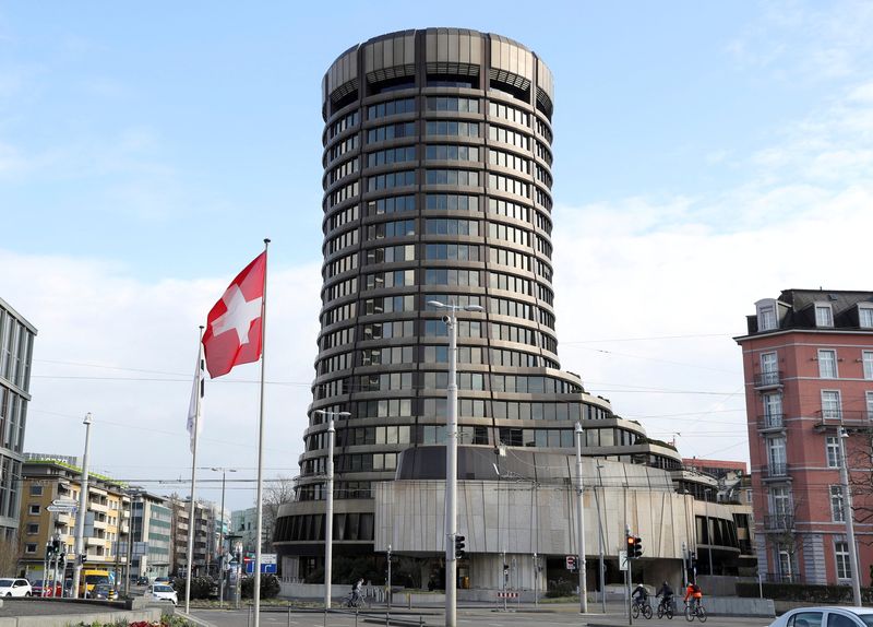 FILE PHOTO: The tower of the headquarters of the Bank for International Settlements (BIS) is seen in Basel, Switzerland March 18, 2021. REUTERS/Arnd Wiegmann/File Photo