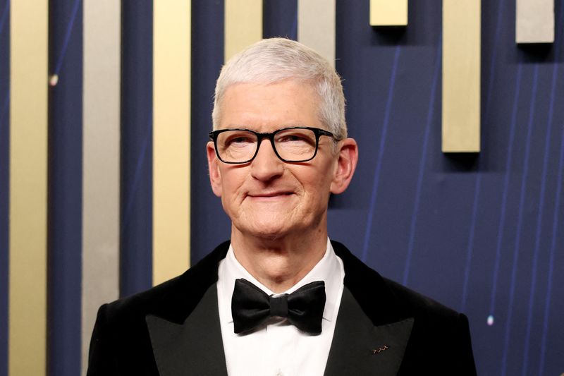 Apple CEO Tim Cook poses on the red carpet at the 77th Primetime Emmy Awards in Los Angeles, California, U.S., September 14, 2025. REUTERS/David Swanson