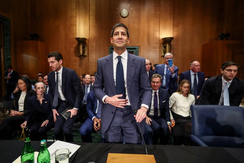 FILE PHOTO: Kevin Warsh, U.S. President Donald Trump's nominee to be next chair of the Federal Reserve, at the end of a Senate Banking Committee confirmation hearing on Capitol Hill in Washington, D.C., U.S., April 21, 2026. REUTERS/Kevin Lamarque/File Photo