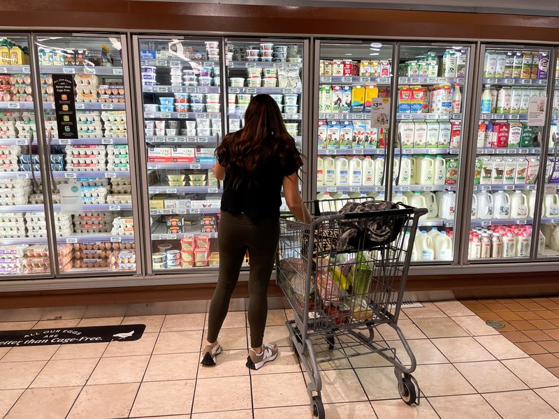 A woman shops in a supermarket as rising inflation affects consumer prices in Los Angeles, California, U.S., June 13, 2022. REUTERS/Lucy Nicholson/File Photo