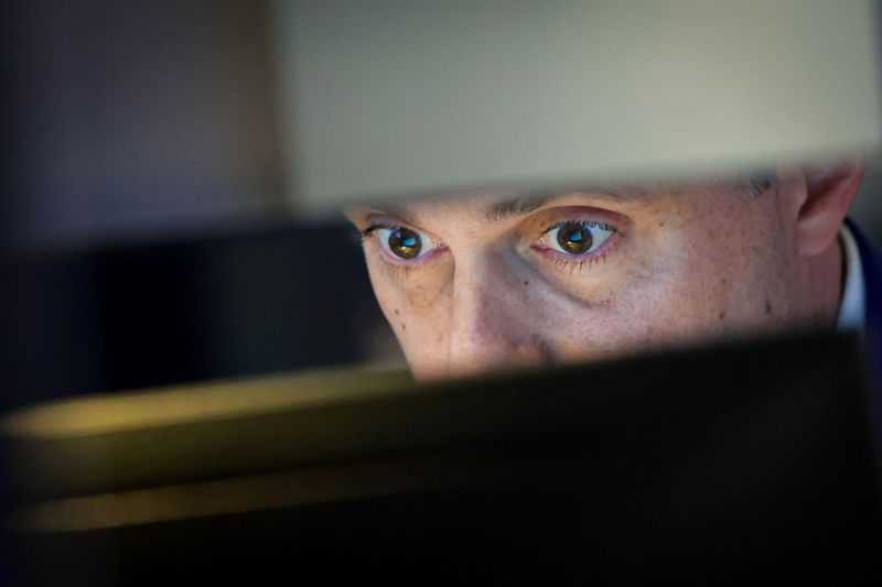 A specialist trader works at his post on the floor at the New York Stock Exchange (NYSE) in New York City, U.S., May 7, 2026.  REUTERS/Brendan McDermid