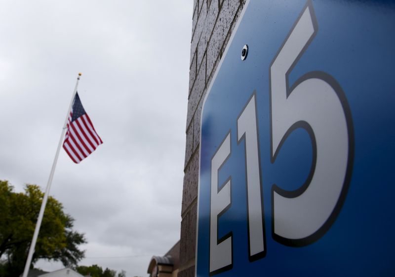 A sign advertising E15, a gasoline with 15 percent of ethanol, is seen at a gas station in Clive, Iowa, United States, May 17, 2015. REUTERS/Jim Young