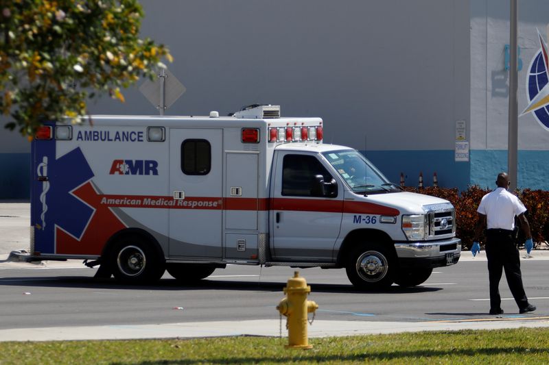 FILE PHOTO: An AMR ambulance leaves the dock at Miami Port, in Miami, Florida, U.S., April 4, 2020. REUTERS/Marco Bello/File Photo