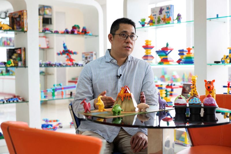 FILE PHOTO: David Cheung, co-owner of Shaoguan Guanghua Plastic & Hardware Products Co., Ltd, speaks during an interview in the company?s showroom in Shaoguan, Guangdong province, China May 9, 2025. REUTERS/Go Nakamura/File Photo