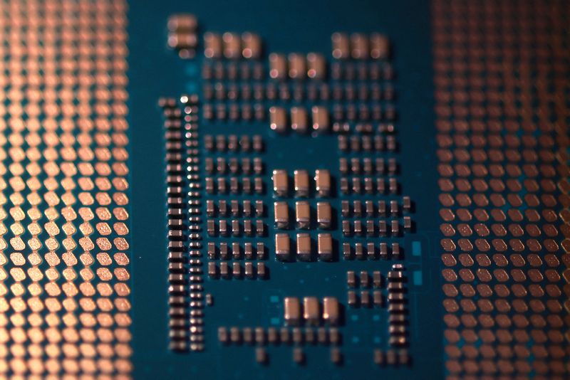 Computer motherboard and chip in this illustration taken August 25, 2025. REUTERS/Dado Ruvic/Illustration