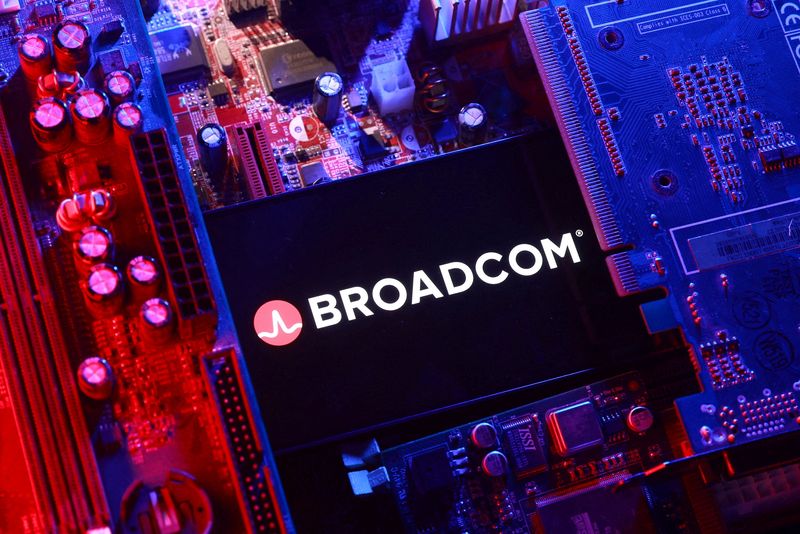 FILE PHOTO: A Broadcom logo and a computer motherboard appear in this illustration created on August 25, 2025. REUTERS/Dado Ruvic/Illustration/File Photo