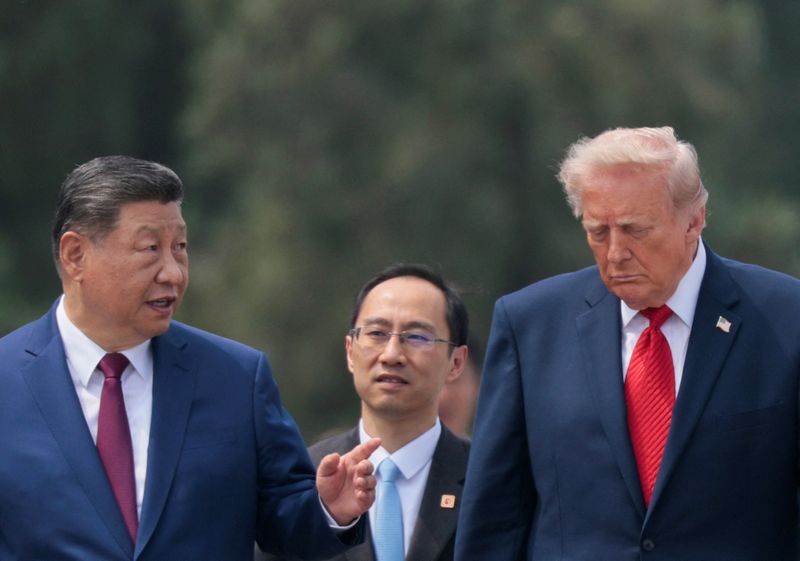 U.S. President Donald Trump and Chinese President Xi Jinping tour the Temple of Heaven in Beijing, China, May 14, 2026. REUTERS/Evan Vucci