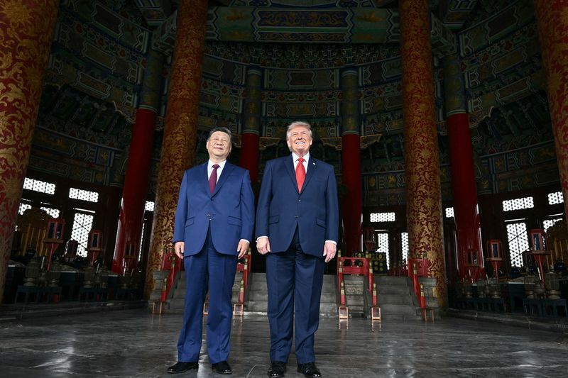 China's President Xi Jinping (L) and US President Donald Trump visit the Temple of Heaven in Beijing on May 14, 2026.  BRENDAN SMIALOWSKI/Pool via REUTERS