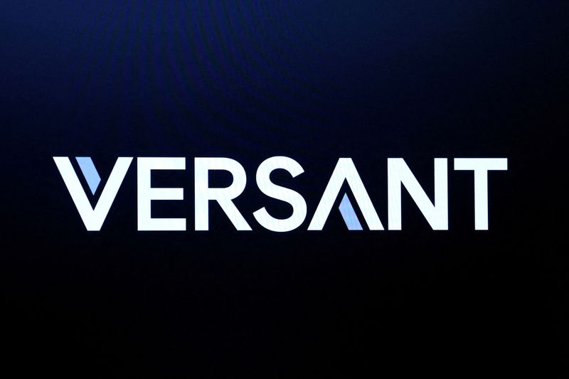 FILE PHOTO: The company logo for Versant is displayed on a screen on the floor at the New York Stock Exchange (NYSE) in New York City, U.S., July 21, 2025.  REUTERS/Brendan McDermid/File Photo
