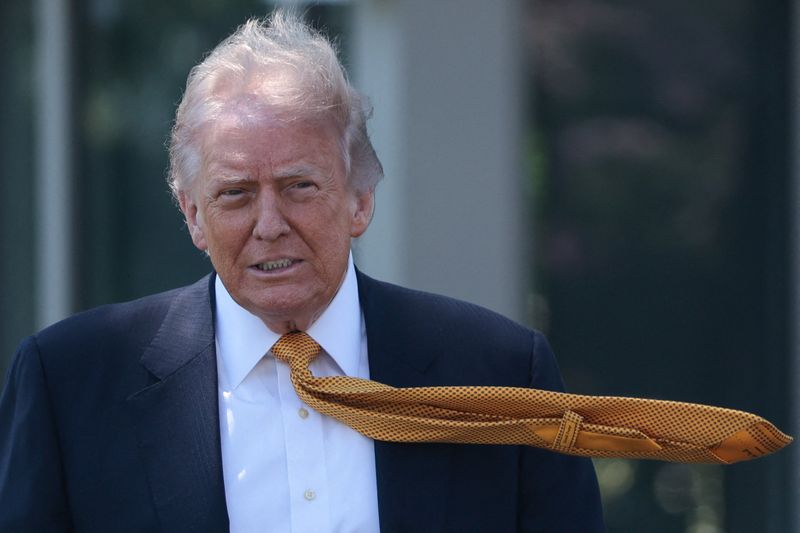 U.S. President Donald Trump walks ahead of departing the White House for Joint Base Andrews en route to Beijing, China, in Washington, D.C., U.S., May 12, 2026. REUTERS/Evelyn Hockstein