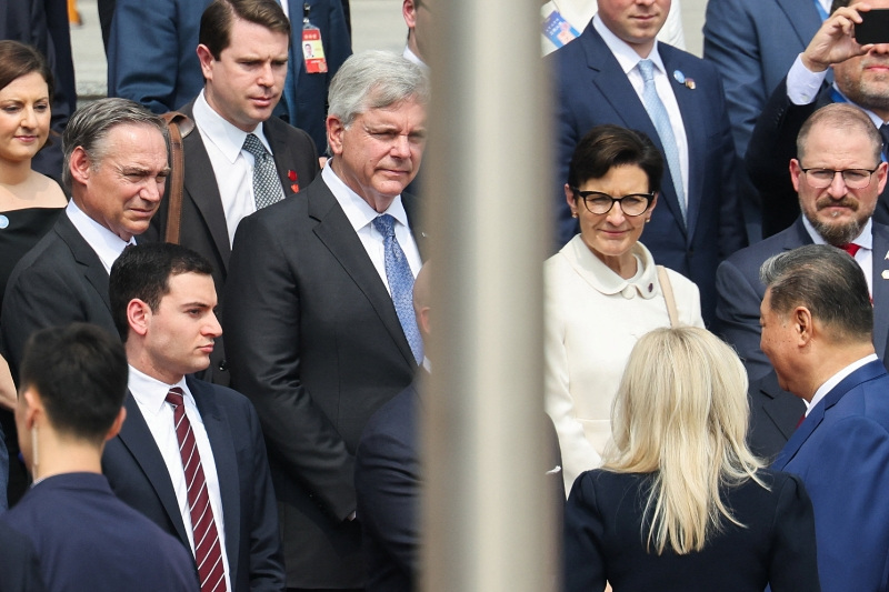 Boeing President and CEO Kelly Ortberg, GE Aerospace Chairman and CEO Larry Culp, Citigroup CEO Jane Fraser, Qualcomm CEO Cristiano Amon and other members of the U.S. delegation attend the welcome ceremony for U.S. President Donald Trump by Chinese President Xi Jinping, at the Great Hall of the People in Beijing, China May 14, 2026. REUTERS/Maxim Shemetov/Pool