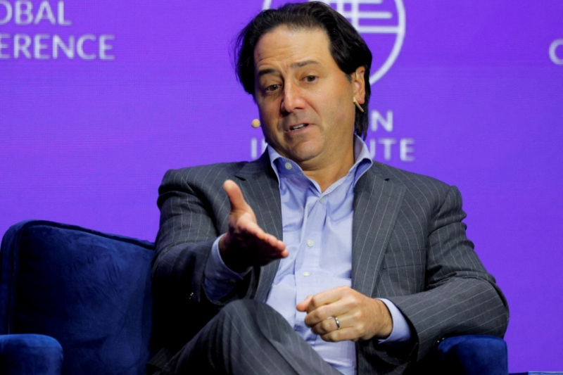 FILE PHOTO: Director, Co-Founder, and CEO at Ares Management Michael Arougheti attends the Milken Conference 2025 in Beverly Hills, California, U.S., May 6, 2025. REUTERS/Mike Blake/File Photo