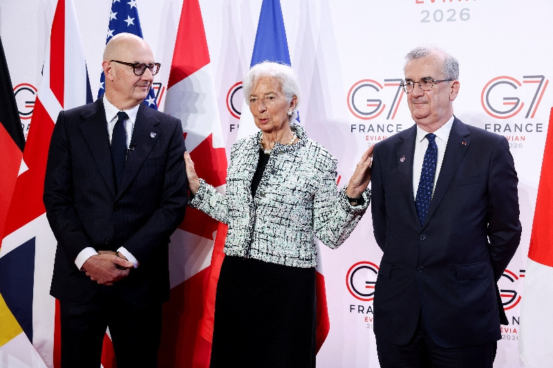 French Finance Minister Roland Lescure, European Central Bank (ECB) President Christine Lagarde, and Governor of Banque de France Francois Villeroy de Galhau pose for a photo ahead of a G7 finance ministers and central bank governors meeting in Paris, France, May 18, 2026. REUTERS/Tom Nicholson