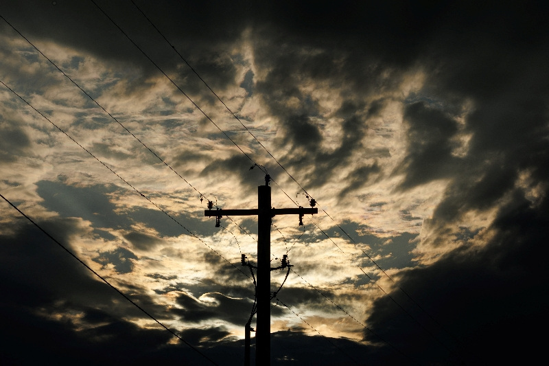 Electrical power lines are shown during a storm in Anson, Texas, U.S., April 24, 2025. REUTERS/Mike Blake