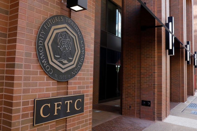 Signage is seen outside of the US Commodity Futures Trading Commission (CFTC) in Washington, D.C., U.S., August 30, 2020. REUTERS/Andrew Kelly