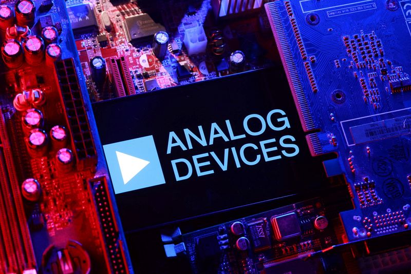 An Analog Devices logo and a computer motherboard appear in this illustration taken August 25, 2025. REUTERS/Dado Ruvic/Illustration
