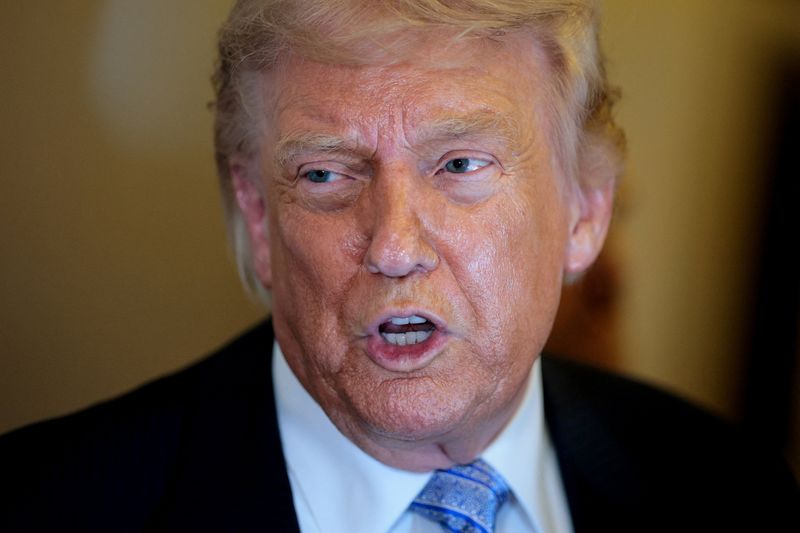 U.S. President Donald Trump speaks to the press aboard Air Force One enroute to the U.S.  following his official visit with President Xi Jinping in China, May 15, 2026. REUTERS/Evan Vucci