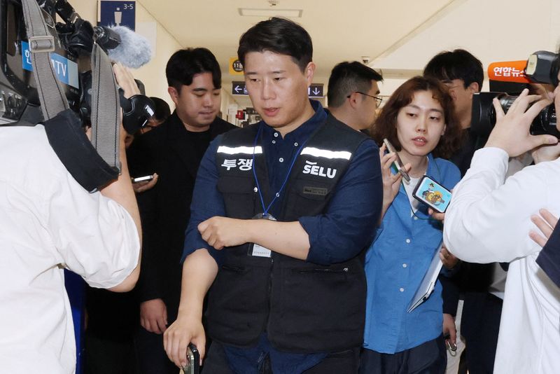 Choi Seung-ho, head of Samsung Electronics' labor union, arrives for an afternoon mediation session at the National Labor Relations Commission in Sejong, South Korea, May 19, 2026.  Yonhap via REUTERS