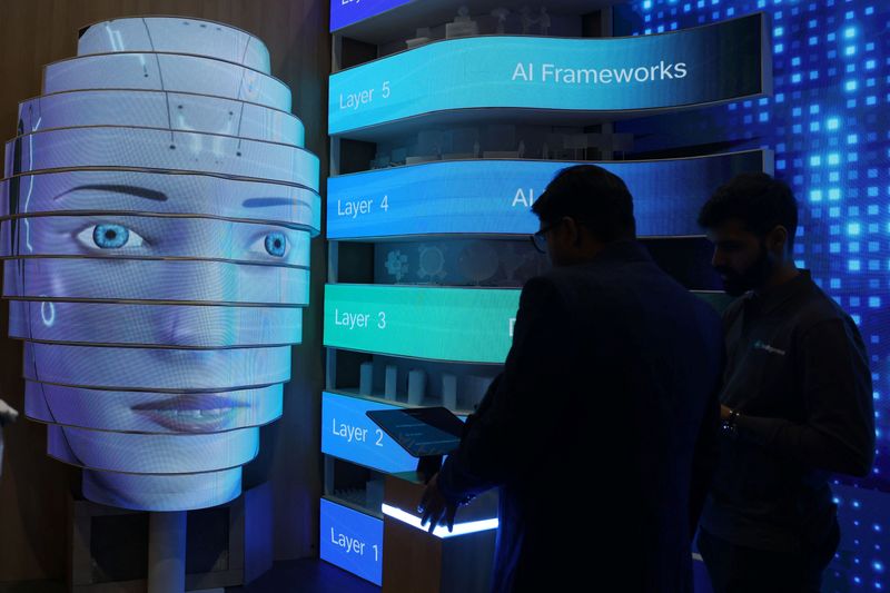 Visitors check a Jio intelligence bot on display at Bharat Mandapam, one of the venues for AI Impact Summit, in New Delhi, India, February 17, 2026. REUTERS/Bhawika Chhabra