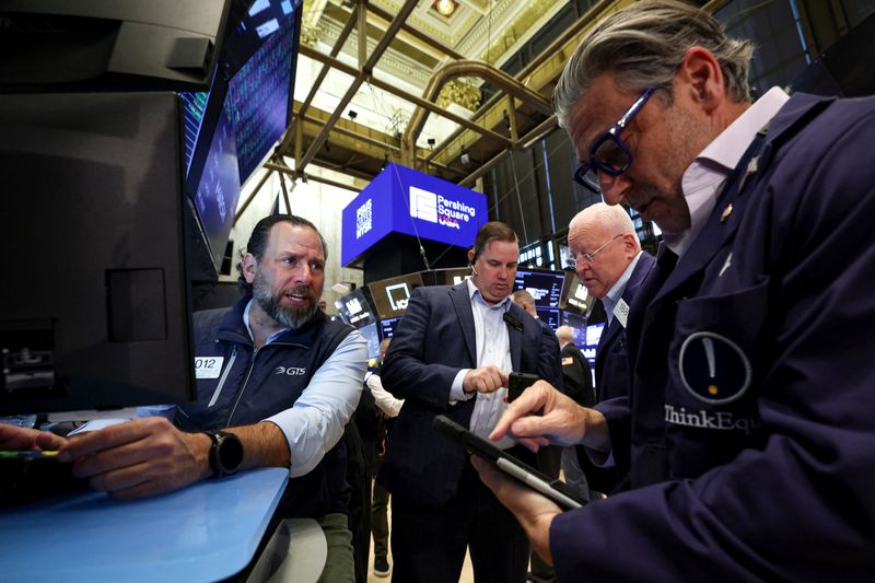 Traders work on the floor at the New York Stock Exchange (NYSE) in New York City, U.S., April 29, 2026.  REUTERS/Brendan McDermid