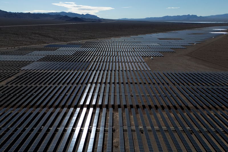 A drone view of sunlight reflecting off solar panels at the Boulder Solar 1 facility in Boulder City, Nevada, U.S., November 23, 2025. REUTERS/Daniel Cole