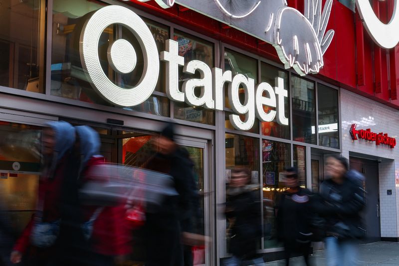 People walk by a Target store in midtown Manhattan in New York City, U.S., March 21, 2025. REUTERS/Kylie Cooper
