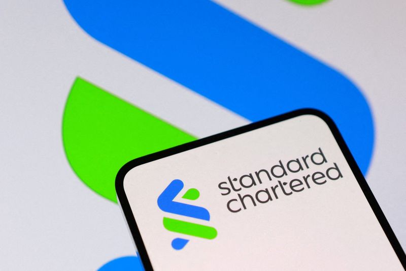 FILE PHOTO: Standard Chartered logo is seen in this illustration taken January 7, 2026. REUTERS/Dado Ruvic/Illustration/File Photo
