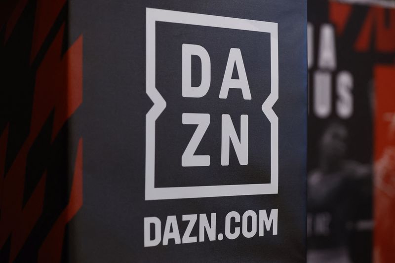 FILE PHOTO: Boxing - Anthony Joshua and Robert Helenius Press Conference - Pan Pacific London, London, Britain - August 9, 2023 A DAZN signage is pictured during the press conference Action Images via Reuters/Peter Cziborra/File Photo