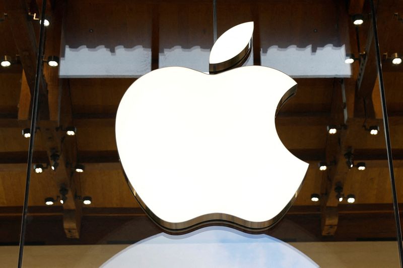 FILE PHOTO: View of an Apple logo at an Apple store in Paris, France, April 23, 2025. REUTERS/Abdul Saboor/File Photo