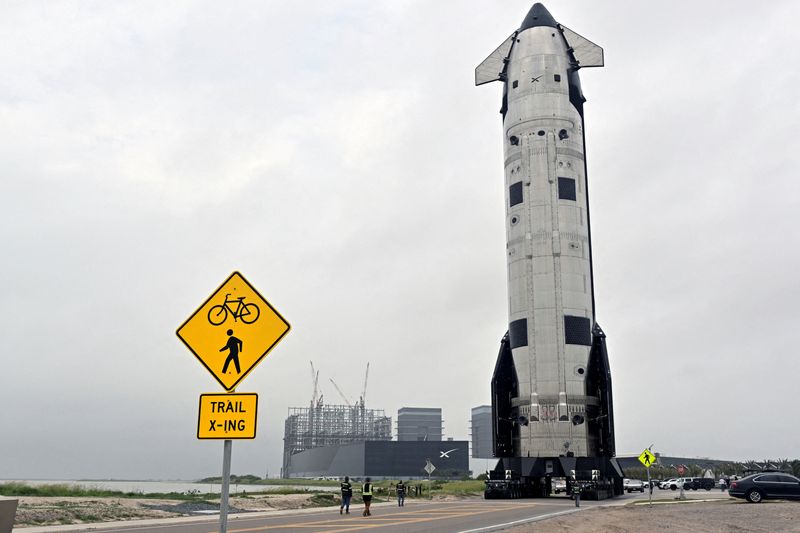 FILE PHOTO: The SpaceX Starship spacecraft rolls out of the production facility toward launch pad 2 ahead of the 12th test flight of the Starship spacecraft in Starbase, Texas, U.S., May 19, 2026. REUTERS/Steve Nesius/File Photo